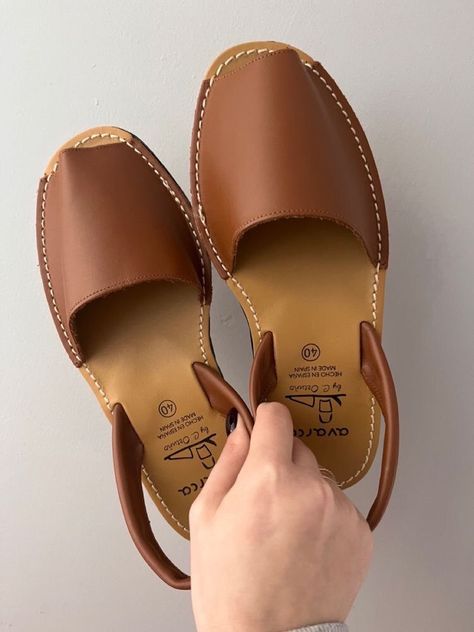 Get back to basics with our timeless brown sandals. Versatile and chic, these sandals are the perfect everyday footwear. Whether you're running errands or going for a casual stroll, these sandals will keep you comfortable and stylish all day long. #sandalsforwomen #zapatosmujer #shinysandals #leathersandals #spain #hendmadeshoes #sandels #summeroutfit #leathershoes #zapatosdemoda Brown Casual Shoes, Spanish Shoes, Menorca Spain, Fancy Shoes, Leather Platform Sandals, Leather Sandals Flat, Slingback Shoes, Leather Sandals Women, Brown Colour