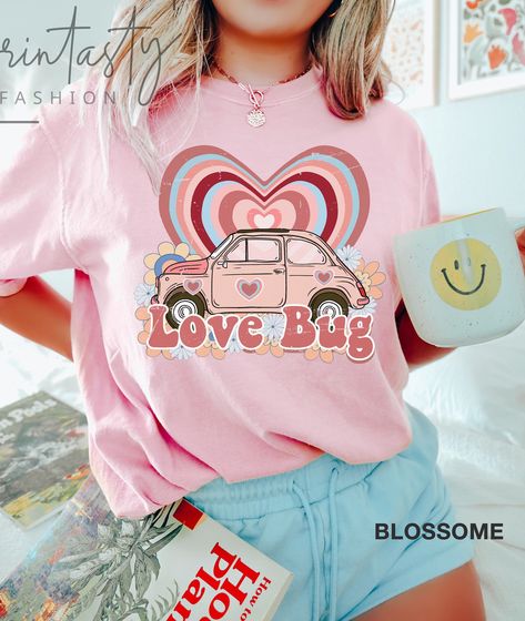 Get ready to celebrate love in style with our trendy Valentine's Shirt! This charming and fashionable shirt is perfect for expressing your affection. It's designed with the utmost care to ensure comfort and versatility. Elevate your Valentine's Day look with this essential piece. Available in a variety of sizes and colors. Spread joy and warmth this Valentine's Day with our must-have shirt! #ValentinesDayFashion #LoveIsInTheAir #ShareTheLove Valentines Day Shirts For Teachers, Valentine Shirt Designs, Valentine Shirts Vinyl, T Shirt Text Design, Bug Valentines, Couple T Shirt Design, Tshirt Prints, Valentines Shirts, Uv Tattoo