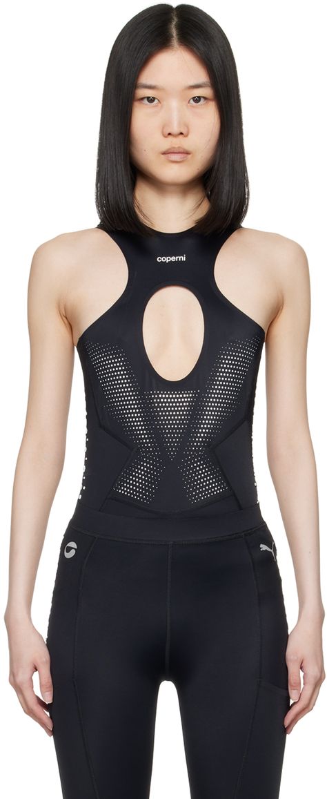 Stretch recycled nylon jersey bodysuit. Reflective detailing, rubberized dots, and bonded seams throughout. · Crewneck · Bonded logo and cutout at chest · Reflective logo at shoulders · Press-stud closure at bottom · Anti-slip trim at inner cuffs · Laser-cutouts at back Part of the Coperni x PUMA collaboration. Supplier color: Black Edgy Activewear, Sports Uniform Design, Activewear Logo, Laser Logo, Designer Sportswear, Laser Cutout, Shoulder Press, Black Puma, Cutout Bodysuit