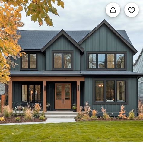 Dark Blue House White Windows, Teal And Black House Exterior, House Exterior Dark Blue, Dark Blue House With Cedar Accents, Brown And Blue House, Black House Colored Door, Dark Slate Blue House Exterior, Dark House Exterior With Wood Accents, Dark Blue Grey House Exterior