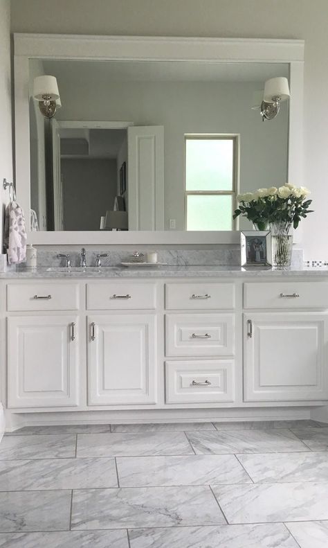 When we moved in to our new house almost two years ago I thought within the first month we would trim our master bathroom mirrors. That obv... Bathroom Mirrors Diy, Bathroom Remodel Cost, Mirror Trim, Bathroom Mirrors, Trendy Bathroom, Large Bathrooms, Bathroom Remodel Master, White Bathroom, Modern Bathroom Design