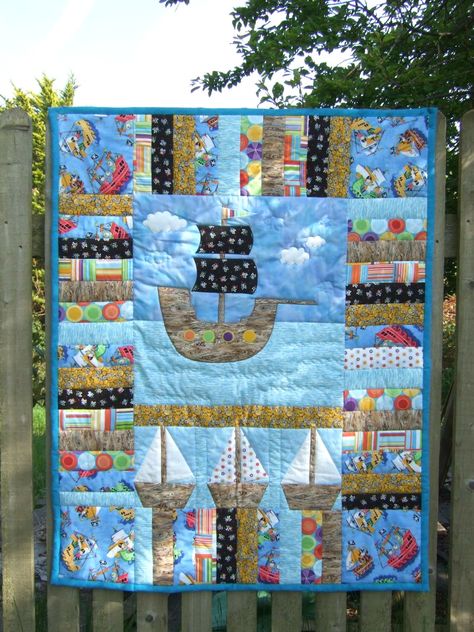 Pirate quilt Pirate Themed Bedroom, Pirate Bedroom Theme, Pirate Quilt, Log Cabin Blocks, Quilt Corners, Pirate Baby, Map Quilt, Map Fabric, Cot Quilt