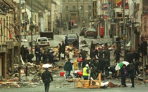 The wreckage of the Omagh, County Tyrone bombing, which killed 29 people, during The Troubles. Northern Ireland Troubles, Car Bomb, The Ira, The Troubles, Irish History, Media Images, Northern Ireland, Baby Month By Month, Google Images