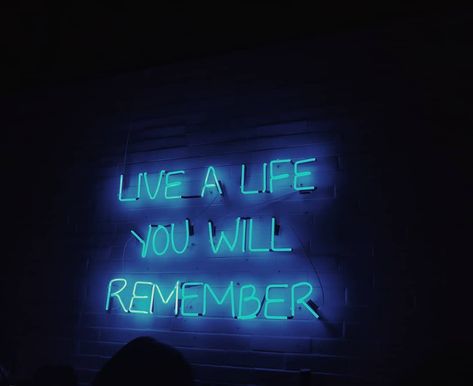 "One day you'll leave this world behind, so live a life you will remember." . . @agenciashuffle @gabb Live A Life You Will Remember Wallpaper, Live A Life You Will Remember, Live A Life You Will Remember Tattoo, Neon Signs Uk, Remember Tattoo, Lounge Reception, Jordan Logo Wallpaper, Neon Signs Quotes, Neon Photography