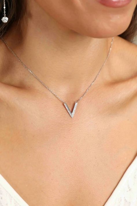 Showcase your personality with LOVCIA Adored Sterling Silver V Letter Pendant Necklace. 🌟Unique pendants for every style at LOVCIA. Shop https://lovcia.com/products/lovcia-adored-sterling-silver-v-letter-pendant-necklace-ltr24101300278574731 . #Lovcia #LovciaJewelry #GiftsForWomen #PendantNecklaces #Necklaces #NecklacesForWomen #Women'sNecklaces #PersonalStyle #Pendants #JewelryForWomen #JewelryForGirls #GiftForHer #GiftForLove #LatestPendantStyle #PendantJewelry V Letter, V Necklace, Letter Pendant Necklace, Outfit Making, Letter Pendants, Unique Pendant, Necklace Silver, Silver Necklaces, Pendant Jewelry