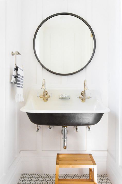 Kid-friendly bathroom with a step ladder, a wall-mounted sink,  and an oversize round mirror hung against crisp white walls. Studio Mcgee Bathroom, Unique Bathroom Sinks, Modern Vintage Bathroom, Cast Iron Sink, Trough Sink, Wall Mounted Sink, Unique Bathroom, Bad Design, Interior Modern