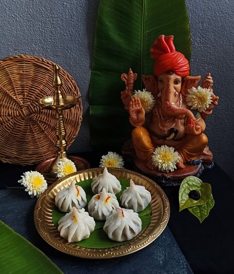 गणपती बाप्पा मोरया || May lord Vighnaharta remove all obstacles from our lives and fill it with joy, prosperity and success!!! On the Auspicious Occasion of Ganesh Chaturthi, I prepared the Iconic Ukdiche Modak / Kozhukattai for my dearest Ganapati Bappa. Ukdiche modak is a Maharashtrian sweet stuffed rice flour dumplings filled with coconut- jaggery stuffing. Here I haven't used the mould to shape the modak!!! Handmade with love💕💕 Ukdiche Modak, गणपती बाप्पा, Flour Dumplings, Ganapati Bappa, Dumpling Filling, My Dearest, Flower Rangoli, Ganesh Chaturthi, Rice Flour