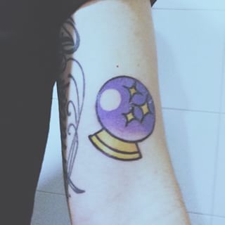 This psychic. | 23 People That Took Their Love For Emoji To A Whole New Level Crystal Ball Tattoo, Emoji Tattoo, Random Tattoos, Vintage Tattoos, Purple Tattoos, Neo Tattoo, Ball Tattoo, Salsa Dancer, Mystical Tattoos