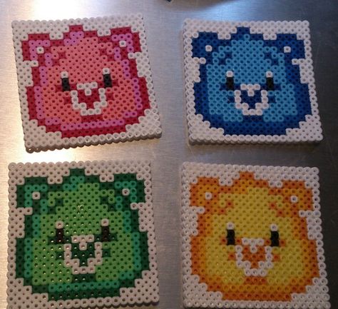 Care Bears coasters hama perler beads by Sonja Ahacarne Hama Beads Coasters, Melty Bead Designs, Melt Beads Patterns, Hamma Beads Ideas, Easy Perler Bead Patterns, Melty Bead Patterns, Pearl Beads Pattern, Easy Perler Beads Ideas, Fuse Bead Patterns