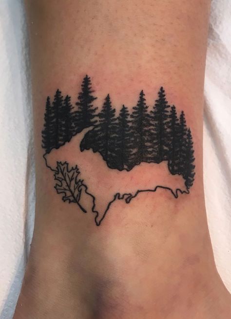 Fir tree, upper peninsula, and oak leaf mash up by Carrie! #customdesigns #tattootime #tattooideas #tattoos #tattooshop #legtattoos #uwo #uwoshkosh #downtownoshkosh #firtree #tattoostudio #customart #oshvegas #ankletattoos #ankletat #outerankle #legtattoodesign Up Michigan Tattoo, North Shore Tattoo, Upper Peninsula Michigan Tattoo Ideas, Upper Peninsula Tattoo Ideas, Upper Michigan Tattoo, Upper Peninsula Michigan Tattoo, Upper Peninsula Tattoo, Midwest Tattoo, Lake Superior Tattoo