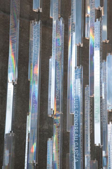 Names of donors are engraved on prism-like Plexiglas rods that change with the light. Donor Signage, Donor Recognition Wall, Donor Recognition, Donor Wall, Wayfinding Signs, Mexico Design, Environmental Graphic Design, Wayfinding Signage, Environmental Design