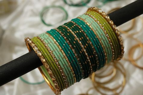 Follow us on Instagram- @studio_kalai Bangle Setting Ideas, Bangles Setting Ideas, Luxury Green Bangle, Bangles Combination, Green Bangles Set, Green Pallet, Green Bangles, Aesthetic Jewellery, Wedding Jewelry Sets Bridal Jewellery