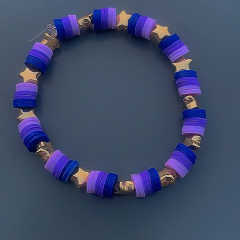 -Dark purple, purple and light purple bracelet with gold star Cheap Purple Bracelets With Tiny Beads, Dark Purple Bracelet, Purple Bracelet Ideas, Clay Bead Designs, Make Clay Beads, Colorful Bead Bracelets, Clay Bracelets, Purple Beaded Bracelets, Clay Bead Necklace