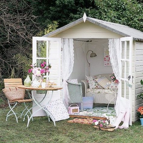 Shabby-chic is a style that works equally well outside. Simply give a shed or summerhouse a coat of white paint, add some salvaged garden furniture and heap with cushions, throws and blankets in soft faded florals Shabby Chic Decorating, Backyard Storage Sheds, Backyard Storage, Shed Kits, Interior Vintage, Decor Shabby Chic, Woman Cave, She Sheds, She Shed