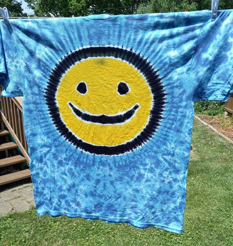 I created this happy smiley face design with a background of shades of blue on a Gildan brand heavy weight 100% cotton t-shirt using Procion dyes that won't wash out or fade. Size unisex L large. See the size chart for measurements. Thanks for shopping! Tie Dye Smiley Face, Smiley Design, Smiley Face Design, Happy Smiley Face, Face Design, Tie Dye T Shirts, Smiley Face, Thanks For Shopping, Dye T Shirt