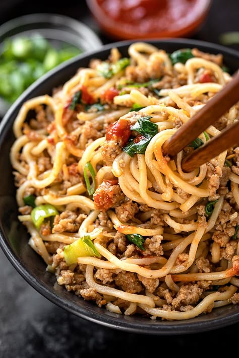 Spicy pork with noodles is a quick and delicious Asian-inspired meal brimming with the flavors of lemongrass, ginger and chili garlic sauce! | thecozyapron.com #spicyporkwithnoodles #spicypork #spicyporknoodles June Recipes, Stir Fried Noodles, Pork Food, Asian Noodle Dishes, Asian Meals, Pork Noodles, Asian Noodle Recipes, Savory Treats, Asian Dinners