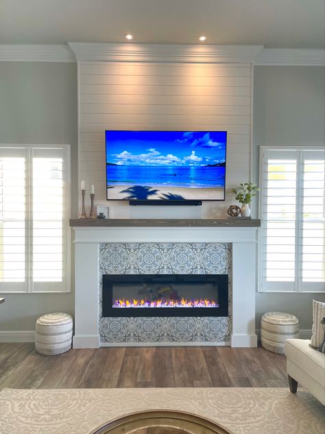 Beachy Fireplace, Electric Fireplace Ideas With Tv Coastal, Beachy Fireplace Ideas, Coastal Fireplace Makeover, Coastal Mantle Decor With Tv, Coastal Electric Fireplace Ideas, Coastal Fireplace Mantle, Beach House Fireplace Ideas, Beach House Electric Fireplace