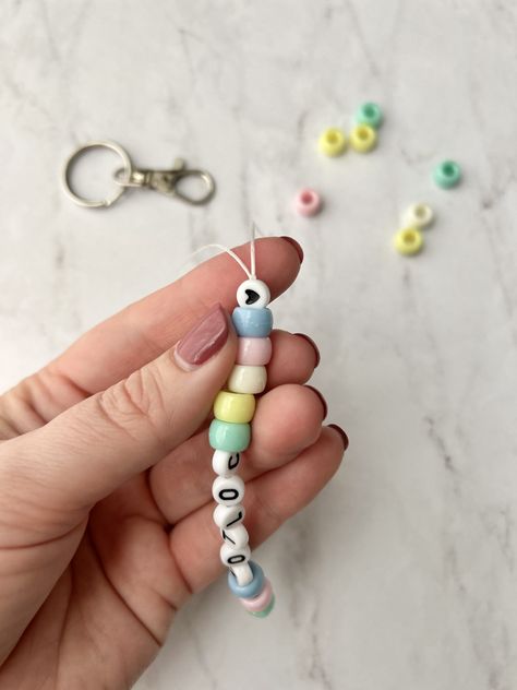 Meet the Teacher Student Keychains Tutorial | Little Fox Teaching Beaded Name Keychain Diy, How To Make Name Keychains, How To Tie Off A Beaded Keychain, How To Make Keychains With Beads, Homemade Keychains Diy, How To Make A Keychain With Beads, Beaded Name Keychains, Name Keychain Diy, Teacher Gifts To Students