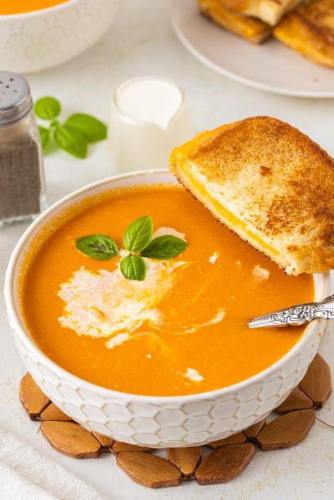 tomato soup with grilled cheese sandwich Creamy Tomato Soup And Grilled Cheese, Tomato Soup With Grilled Cheese, Soup With Basil, Soup With Grilled Cheese, Tomato Soup Grilled Cheese, Creamy Tomato Soup Recipe, Creamy Tomato Soup, Tomato Soup Recipes, Cheese Sandwich