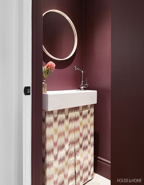 Go bold with a rich Bordeaux in a powder room for an instant cocooning effect. | Photographer: Valerie Wilcox | Designer: Joel Bray Cloverdale Paint, Mode Monochrome, Fall Color Trend, Farrow & Ball, Sarah Richardson, Powder Room Makeover, Makeover Tips, Glass Front Cabinets, Purple Pillows