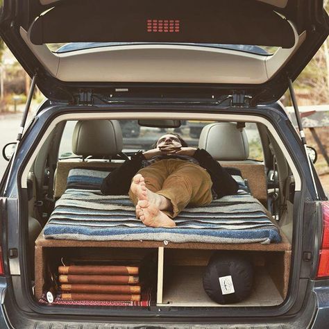 Subaru Outback sleeping platform fully converted and ready to roll! 6'3 inches head to toe and 3 more inches of width than a twin size bed! Plenty of room for 2 people, or one and a dog! Available and customizable for any hatchback or SUV. contact for details. . . . . #carcamping #subaru #subarunation #subaruoutback #homeiswhereyouparkit #camping #dirtbag #polerstuff #campvibes #livefolk #liveauthentic #oregonexplored #handmade #carporn #carpentry #woodbed Van Living Conversion, Sleeping In A Car, Suv Camper, Auto Camping, Stealth Camping, Minivan Camping, Suv Camping, Best Suv, Bed Platform