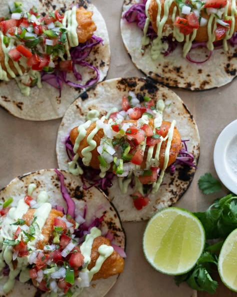 Baja Fish Tacos are beer battered and fried until crispy. Place them in a warm tortilla with a cabbage slaw, avocado crema and pico de gallo. Lingcod Fish Tacos, Authentic Fish Tacos, Crispy Fish Tacos With Cabbage Slaw, Fish Tacos Cod, Seafood Extravaganza, Birria Tacos Recipe, Southwestern Food, Fish Taco Recipe, Fried Fish Tacos