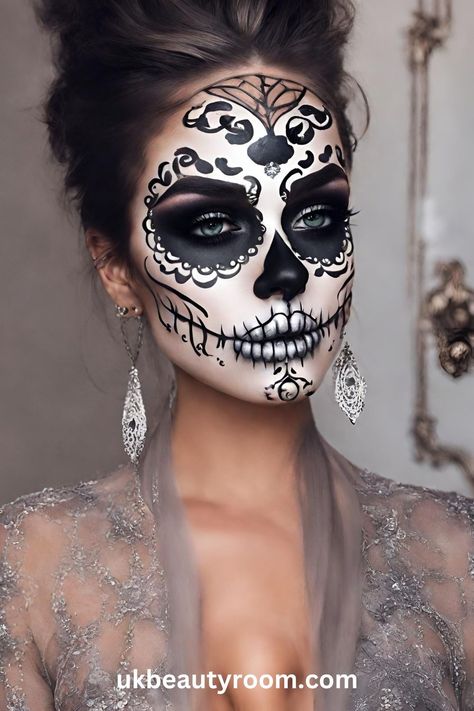 Sugar skull makeup is a colorful and artistic face painting style inspired by the Mexican holiday, Día de los Muertos (Day of the Dead). It involves using bright colors, white and black paint to create designs on the face that resemble ornate sugar skulls. This post list 17 pretty sugar skull makeup ideas you can create at home. easy, pretty, tutorial, easy simple, for men, half, kids easy, DIY, for men with beards, half face, step by step Skull Faces Halloween, Face Paint For Women Halloween, Easy Half Face Halloween Makeup, Jeweled Skull Makeup, Women’s Halloween Face Paint Ideas, Skeleton Makeup Women Easy, Catrina Make Up Ideas, Katrina Face Painting, Sugar Skull Makeup Ideas