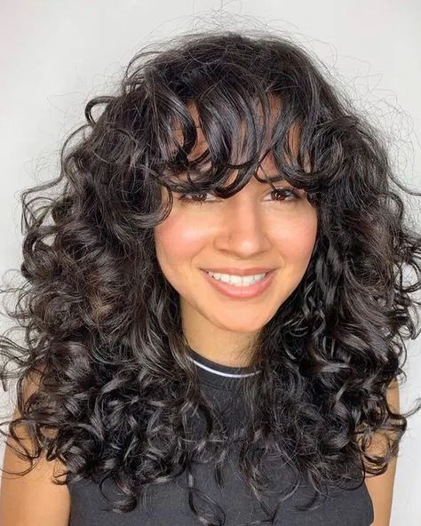 19 Curly Hair Bangs Styles for Every Face Shape - Get Inspired Now Face Framing Bangs Curly Hair, Curly Hair Celebrities, Blonde Curly Bob, Messy Blonde Hair, Perfect Curly Hair, Waterfall Hairstyle, Curly Pixie Hairstyles, Face Framing Bangs, Nancy Sinatra