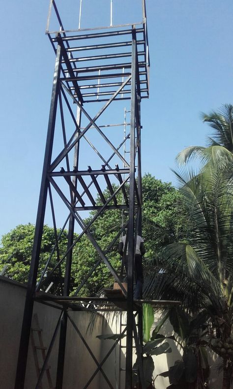 25 feet tank scaffolding  designed and constructed  by meksmetal 08030749209 Water Tank Tower Design, Water Tank Stand Design, Scaffolding Design, Ninja Wallpaper, Welding Design, Steel Building Homes, Steel Water Tanks, Metal Doors Design, Iron Door Design