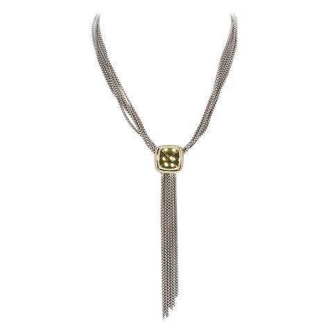 We are pleased to offer this David Yurman Sterling Silver & 18k Yellow Gold Citrine Albion Tassel Necklace. The Albion line was introduced in 1994. David Yurman wanted to design a line with a dramatic center stone and low profile that would sit comfortably. Albion would redefine how jewelry is worn—day or night, casually and effortlessly. The pendant is 20mm x 20mm and features a cushion cut yellow citrine. The necklace is adjustable in length from 16-18.5". The necklace is in very good condition with very few signs of wear and was recently polished your master jeweler. David Yurman Necklace, Multi Chain Necklace, Diamond Heart Pendant Necklace, Graduation Necklace, Heart Pendant Diamond, Yellow Citrine, Citrine Stone, Station Necklace, Sterling Silver Necklace Pendants