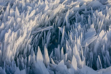 Shards of ice pile up along the South Haven Pier in South Haven, Michigan on March 19, 2019.  (Joel Bissell/Kalamazoo Gazette via AP) via @AOL_Lifestyle Read more: https://www.aol.com/article/weather/2019/03/21/piles-of-jagged-ice-shards-create-surreal-scene-on-lake-michigan/23698005/#slide=7546570#fullscreen?a_dgi=aolshare_pinterest Ice Shards, Ice Aesthetic, Michigan Lake, Frozen Water, Surreal Scenes, Moving Water, Ice Crystals, Beautiful Notes, Frozen Lake