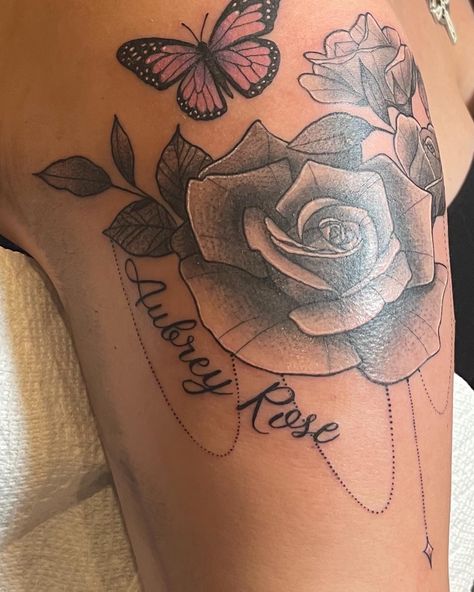 Flowers Around Name Tattoo, Violet Flower Name Tattoo, Iris Name Tattoo, Flower Butterfly Name Tattoo, Hibiscus Name Tattoo, Butterfly With Names Tattoo, Name Tattoos On Arm, Name Flower Tattoo, Rose And Butterfly Tattoo