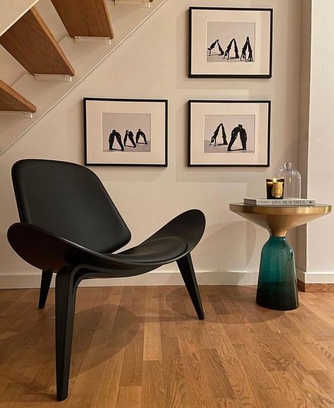 This black Shell chair is such a head-turner. @biljana_nr.92 was very clear on going for minimalism. The small table on the side made the overall look so cozy. Shell chair is still in stock. Link in bio to learn more. Sebastian Herkner, Shell Chair, Small Table, Dec 7, Small Tables, Modern Spaces, M S, Century Modern, Mid-century Modern