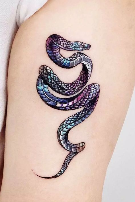 Elevate your tattoo game with incredible snake tattoo designs. Explore more at Glaminati.com! 🐍 #TattooGoals #InkMasterpiece #SerpentTattoo Snake Tattoo 3d, Snake Color Tattoo, Colored Snake Tattoo, Colorful Snake Tattoos For Women, Green Snake Tattoo, Color Snake Tattoo, Colour Snake Tattoo Design, Raven And Snake Tattoo, Green Snake Tattoos For Women