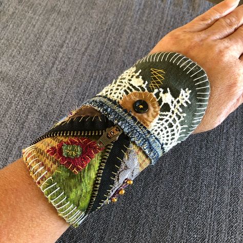 This Bracelet Was Made By My Mom From Fabric Scraps & Other Embellishments. She's Been Sewing Since She Was Young And Now That She's Retired, Exploring Sewing In A More Creative Way, Rather Than Doing It To Make Ends Meet. Approximately 5” At Widest Point And 3.5” Inches At Narrowest Point I Have Approximately A 6.5" Wrist, So You Can See The Fit In The Pictures For A 6.5" Wrist. Fits Up To An 8.5" Wrist And Is Meant To Fit Loosely So That It Covers Part Of Your Hand. Button & Loop Closure Tags: Handmade Cottagecore Hippie Bohemian Upcycled #Slowfashion Patchwork Upcycled Bracelets, Fabric Bracelets Diy, Cuff Bracelets Diy, Fairy Pouch, Fabric Cuff Bracelet, Boho Cuff Bracelet, Denim Crafts Diy, Natural Dye Fabric, Fiber Art Jewelry