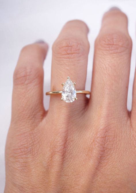 Gold Ring With Pear Diamond, Small Pear Engagement Ring Gold, Simple Pear Wedding Rings, Tear Drop Solitaire Engagement Ring, Pear Engagement Ring Plain Band, Pear Ring With Gold Band, Wedding Rings Gold Teardrop, Engagement Rings Gold Tear Drop, Pear Shaped Engagement Rings Solitaire