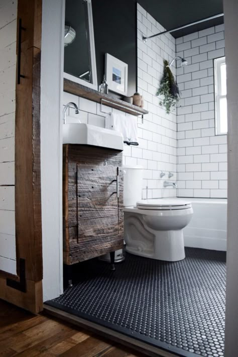 Matte black penny tile in a rustic modern bathroom. Penny Tiles Bathroom, Rustic Modern Bathroom, Half Bathroom Decor, Farmhouse Bathroom Remodel, Bathroom Vanity Decor, Redecorating Ideas, Modern Bathroom Remodel, Farmhouse Bathroom Vanity, Penny Tile