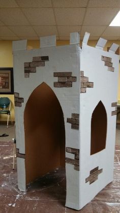 Castle made from fridge box Mighty Fortress Vbs, Keepers Of The Kingdom Vbs, Castle Vbs, Keepers Of The Kingdom, Kingdom Vbs, Halloween Classroom Door, Cardboard Castle, Castle Party, Knight Party