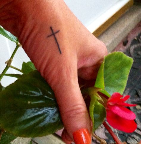 Small black cross tattoo above thumb Cross On Thumb Tattoo, Cross Thumb Tattoo, Black Cross Tattoo, Black Cross Tattoos, Thumb Tattoos, Tattoos Simple, Chick Pea, Small Tattoos Simple, Stick N Poke Tattoo