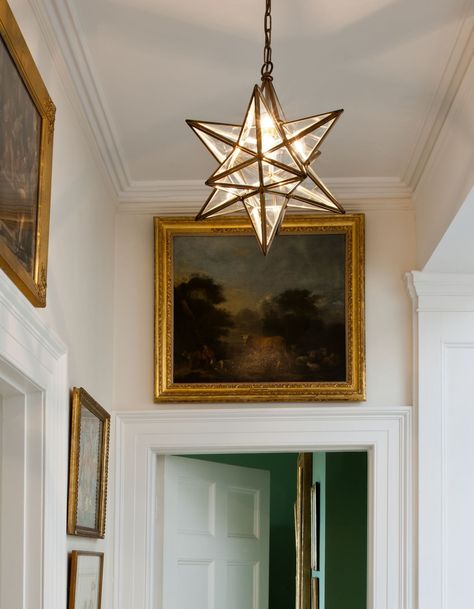 The Star Lantern is one of the first designs Lucy & Michael had made when they started selling back in 1983.  An elegant combination of brass and glass, the light is similar in style to the 19th century bohemian lanterns Edwin Lutyens so admired. #vaughandesigns #countdowntonewyear #interiorlighting #design #brass #glass #vaughan #england #englishdesign #lighting #interiordesigner #interiordesign #homedecor #antique #home #interiors #interiorinspiration #star #lantern #traditional #light Bohemian Lanterns, Hanging Lanterns Living Room, Vaughan Lighting, Lantern Living Room, Edwin Lutyens, Star Pendant Lighting, Star Lantern, Traditional Light, Star Lanterns