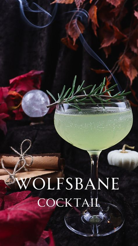 Capture the magic of Hogwarts and the wizarding world with a cocktail inspired by Professor Lupin and his werewolf affliction! Wolfsbane potion was created in order to relieve the symptoms of werewolfery by allowing the werewolf to sleep through its monthly transformation. This cocktail is smoky and woodsy with smoked rosemary gin and using burnt rosemary to smoke the glass. This cocktail is perfect for impressing your guests at your next Harry Potter themed party! Harry Potter Cocktail Party, Dnd Themed Cocktails, Luau Cocktails, Dnd Themed Drinks, Dnd Cocktail Recipes, Slytherin Drink Recipe, Twilight Themed Alcoholic Drinks, Dnd Cocktails, Werewolf Themed Cocktails