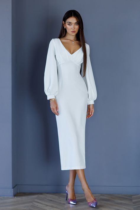 Embrace pure elegance with our White V-Neck Puff-Sleeve Midi Dress. The pristine white hue exudes sophistication, while the v-neckline adds a touch of femininity. The puff sleeves create a voluminous and playful silhouette, elevating the overall look. #whitedress #dress #dresses #weddingdress #mididress #elegantdress #fashion #clothing #fashionstatement #womenwear #dresslover City Hall Wedding Outfit, Long Sleeve White Dress, Puffed Long Sleeves, Zipper Lock, City Hall Wedding, V Neck Midi Dress, Puff Sleeve Dresses, Crop Top Shirts, Fashion Night