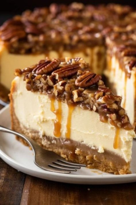 Calling all pecan lovers and cheesecake enthusiasts! National Pecan Day just got a whole lot more exciting with this showstopping Spiced Maple Pecan Pie Cheesecake.  Imagine the rich, creamy cheesecake filling infused with the warmth of maple syrup and a touch of spice, all nestled in a graham cracker crust studded with crunchy pecans.  But wait, there’s more! This masterpiece is crowned with a decadent praline pecan topping, a symphony of caramelized sugar, nuts, and pure deliciousness. Maple Pecan Topping, Maple Pecan Cheesecake, Praline Pecan Cheesecake, Praline Cheesecake, Pecan Pie Cheesecake Recipe, Maple Pecan Pie, Caramel Pecan Cheesecake, Maple Syrup Recipes, Pecan Topping