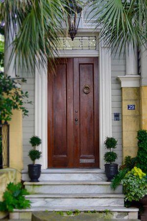 Stained Double Doors Rustic Farmhouse Exterior, Double Door Entryway, Wooden Double Doors, Commercial Garage Doors, Garage Door Types, Blue Front Door, Front Door Entryway, Brown Doors, Antebellum Homes