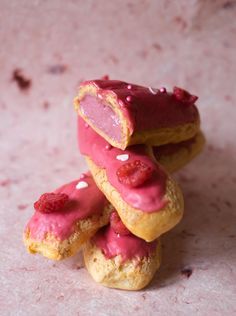 Delicious eclairs with a raspberry cremeux, raspberry icing and craquelin. These are decorated with fresh raspberries and sugar decorations. Raspberry Eclairs, Eclair Recipe, Profiterole, Choux Pastry, Eclairs, Pastry Recipes, Tray Bakes, Baked Goods, Sweet Recipes