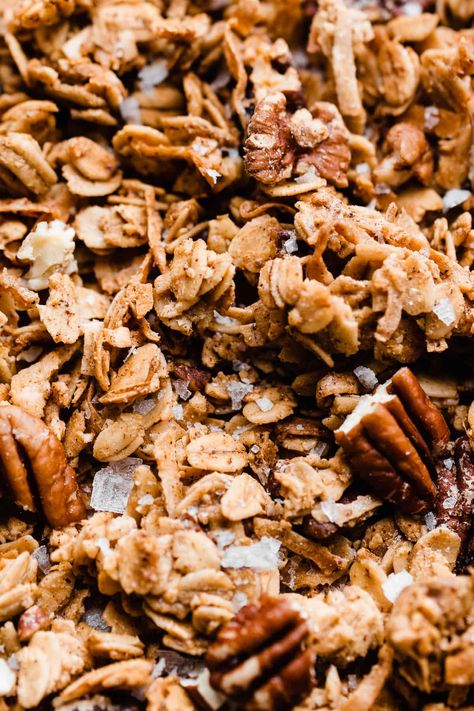 This Gluten-Free Maple Granola is full of cozy spices, whole food ingredients, and is incredibly easy to make! It's made with oats, pecans, coconut, spices, and real maple syrup and comes together in just 30 minutes, from start to finish! This granola tastes and smells like spiced oatmeal cookies! #maplegranola #glutenfreegranola #granola #granolarecipe #glutenfreerecipes #breakfastrecipes #glutenfreebreakfast #mealprep #veganrecipes #veganbreakfast #bluebowlrecipes | bluebowlrecipes.com Maple Granola Recipe, Maple Pecan Granola, Spiced Oatmeal, Maple Granola, Cinnamon Granola, Pecan Rolls, Gluten Free Granola, Pecan Pralines, Maple Pecan