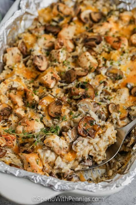 Baked chicken & wild rice casserole is a creamy, cheesy dish that will easily feed a crowd. Serve with a side of roasted veggies or a fresh crisp salad for the perfect meal! #spendwithpennies #chickenandwildricecasserole #recipe #casserole #chickencasserole #wildrice #maindish #creamy #easy #mushroomsoup #chickenandrice Thanksgiving Chicken Casserole Recipes, Chicken Casserole Cream Of Mushroom, Chicken Veggie Casserole Recipes, Wild Rice And Chicken Casserole, Chicken Mushroom Rice Casserole, Sides With Chicken, Healthy Chicken And Rice Recipes, Chicken And Veggie Casserole, Meals For Seniors