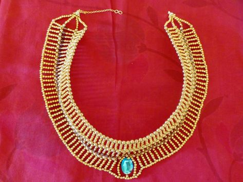 Elegant Egyptian DIY Necklace | AllFreeJewelryMaking.com Egyptian Necklace Diy, Egyptian Inspired Jewelry, Egypt Crafts, Ancient Egyptian Jewelry, Make A Necklace, Egyptian Necklace, Vintage Engagement Rings Sapphire, Exotic Jewelry, Long Pearl Necklaces