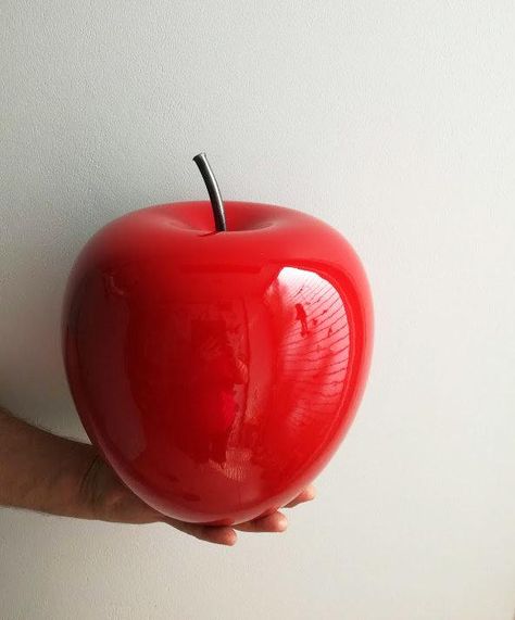 Large apple sculpture is a large, scarlet, ceramic apple sculpture with a black, iron stem.An amazing, bold, apple sculpture, a lovely, Greek ceramics apple, by our shop member, Opto. A gorgeous, large apple sculpture, made of earthenware clay and glazed with a red glaze.The apple sculpture carries a hand forged, black iron stem. The apple is wheel thrown and fired twice, the second time with the red glaze on.The stem is added after the seond firing is completed. This apple sculpture measures 22 Apple Sculpture, Ceramic Apple, Sculpture Modern, Apple Art, Polymer Crafts, Oval Plates, Earthenware Clay, Color Glaze, Small Charms