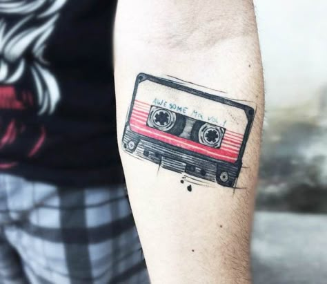 Tape tattoo by Felipe Mello | Post 18173 Cassette Tattoo, Tape Tattoo, Nerd Tattoos, 90s Tattoos, Avengers Tattoo, Nerd Tattoo, Galaxy Tattoo, Music Tattoo Designs, Marvel Tattoos